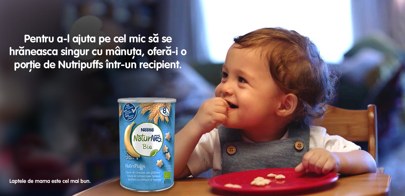 bebe se hraneste singur cu nutripuffs